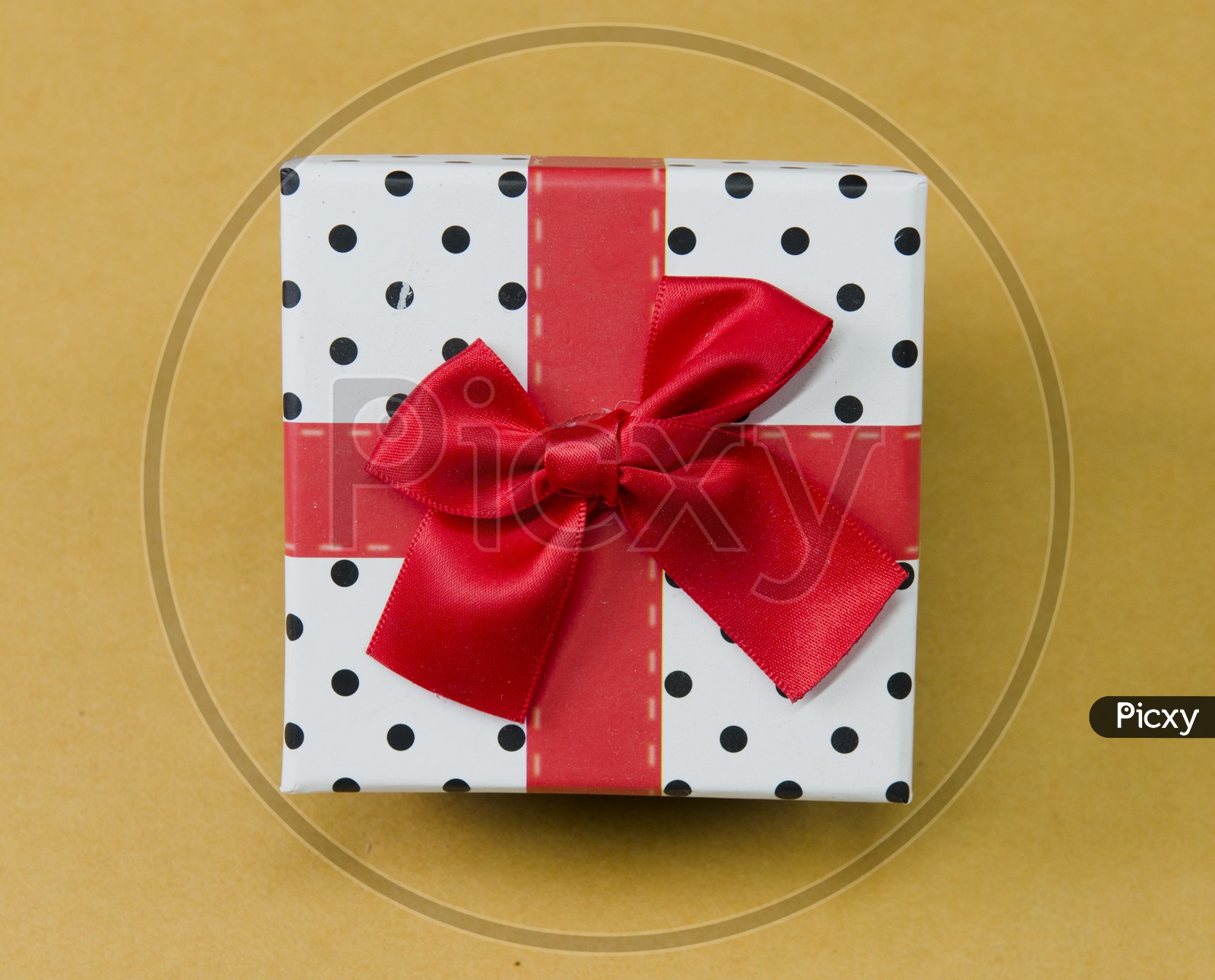 A Ribbon wrapped polka dots gift box