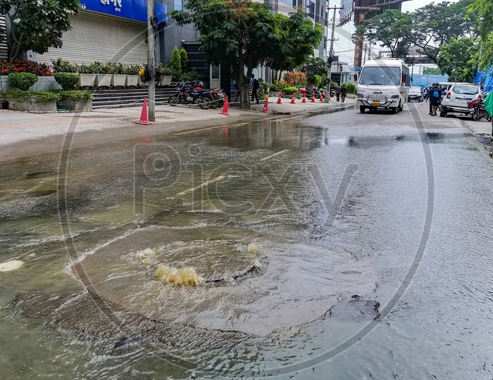 Overflowing Manholes  With Drainage Or Sewage Water in a Street