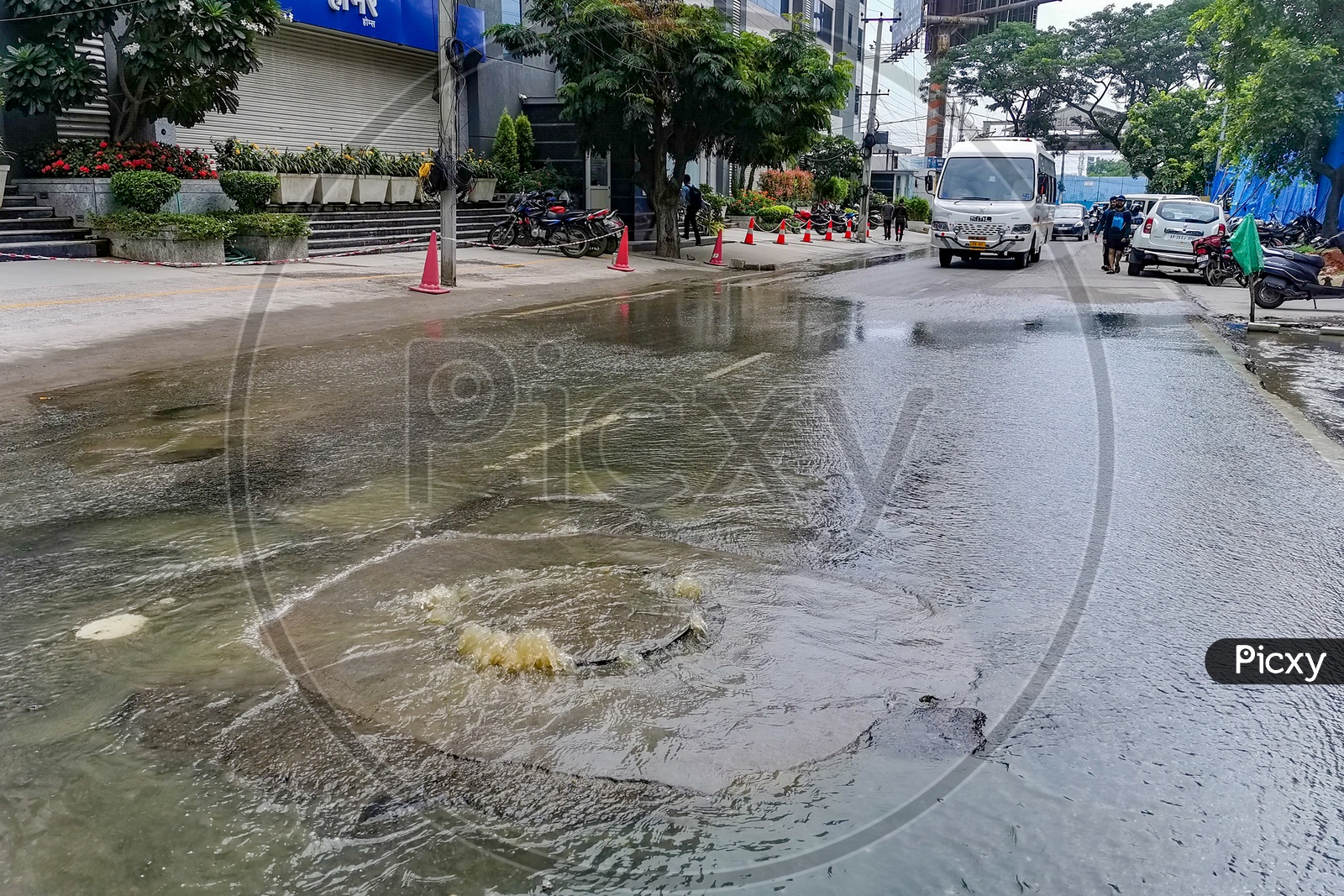 Overflowing Manholes  With Drainage Or Sewage Water in a Street