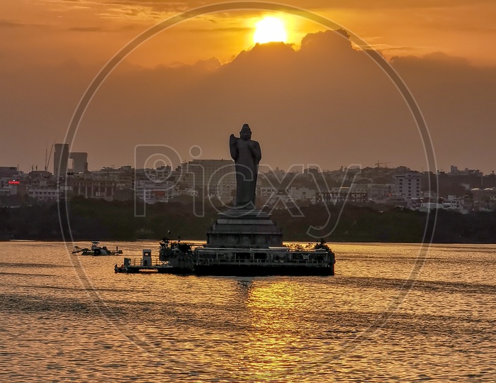 Buddha Statue With sunset Golden Sky In Hussain Sagar Lake at Tankbund , Hyderabad