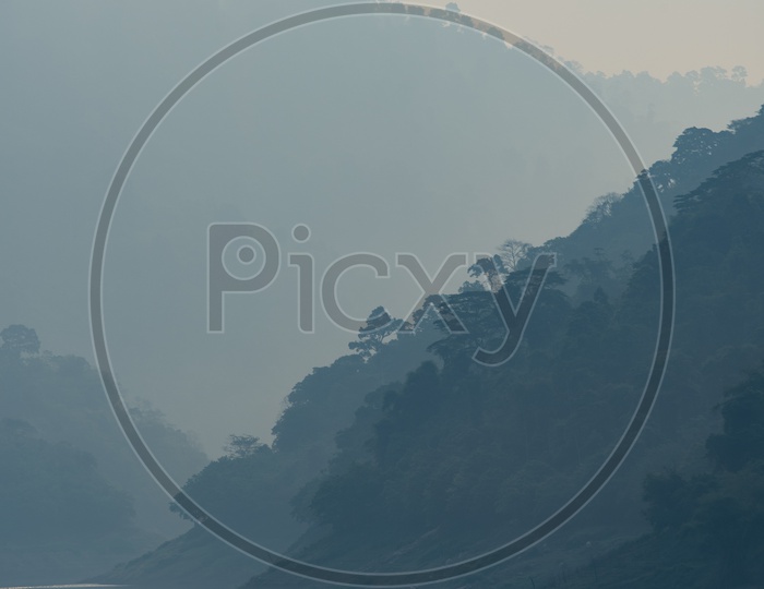 Mountain layers with lake, tropical forest, nature background