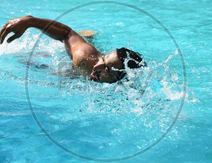 Indian Man swimming