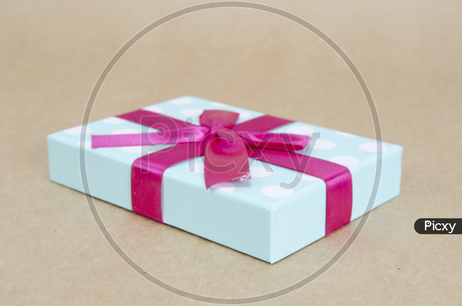 A Gift box top with ribbon