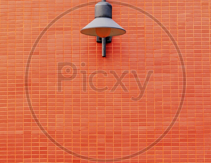 Light Post Or Lamp post To a brick Wall
