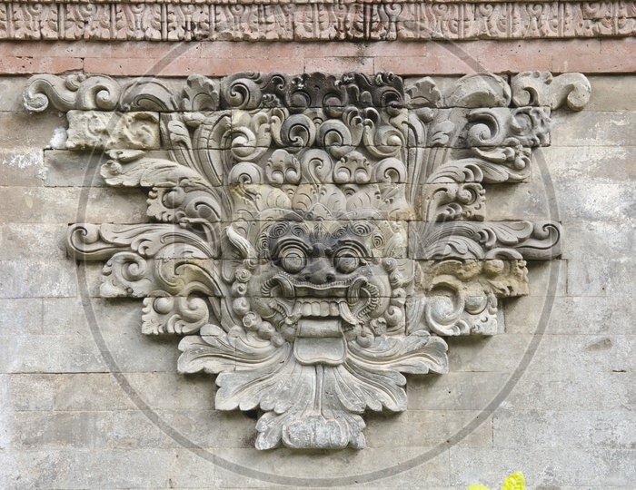 Stone Carving on the ancient temple of Taman Ayun Temple in Bali.