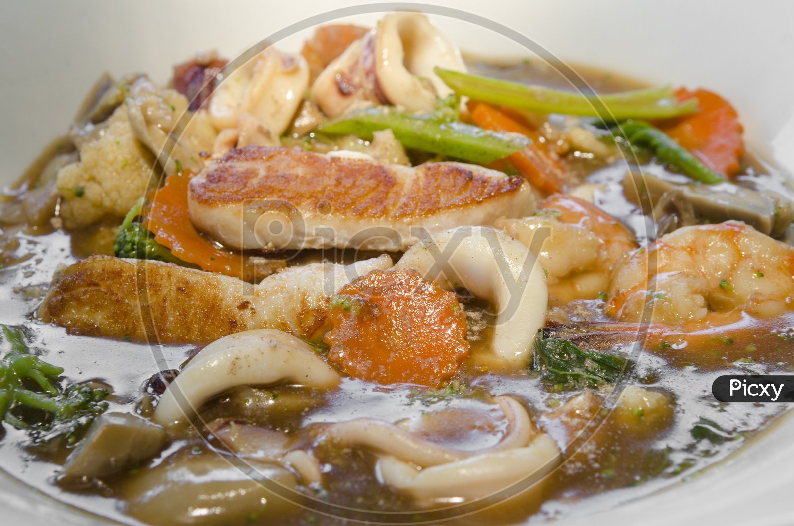 Thai Seafood dinner made with shrimp, mussel, salmon,