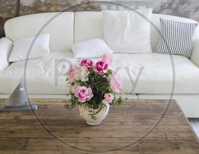 A Flower vase on the wooden table