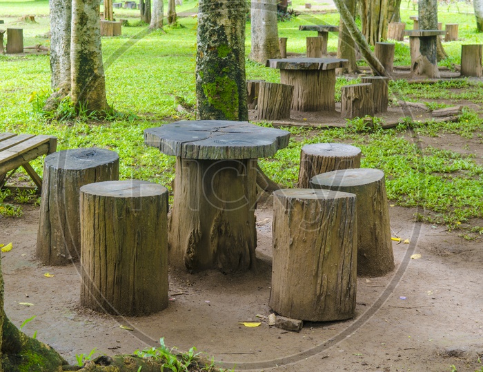 Garden furniture made from wooden log in Thai Park