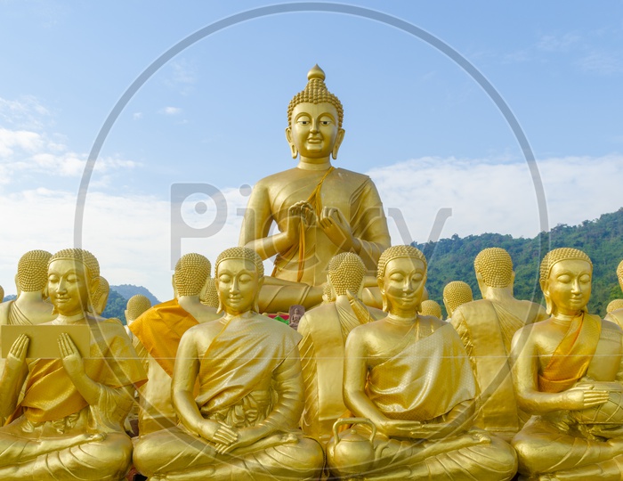Golden Buddha Statue With 1250 Disciples At Nakhonnayok , Thailand