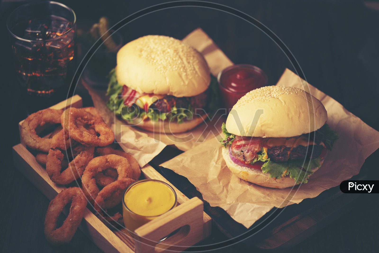 Close-up of home made tasty burgers on wooden table