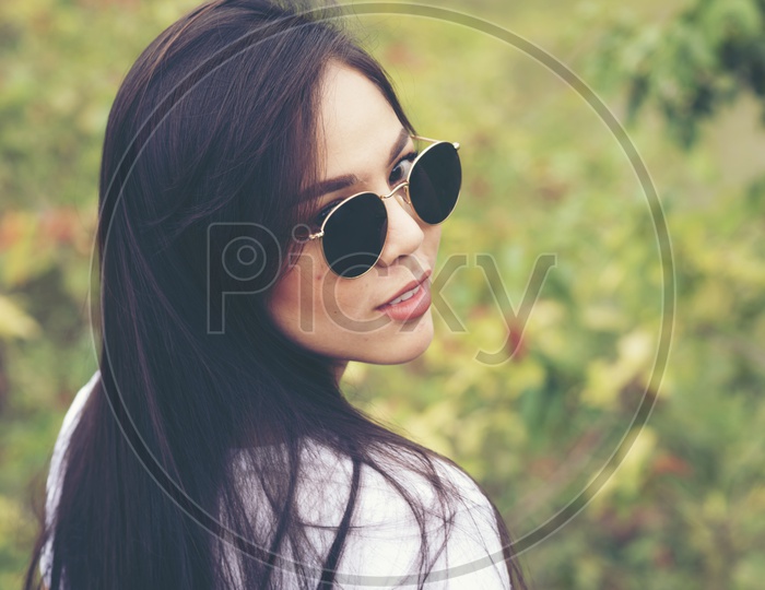 portrait girl on outdoors with sunglasses