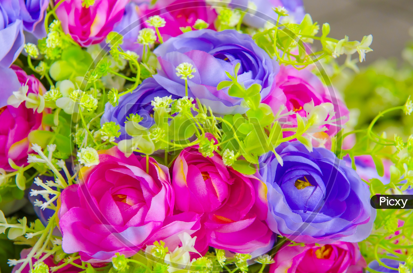 Fresh Flowers Closeup in a Flower Bouquet Forming a background
