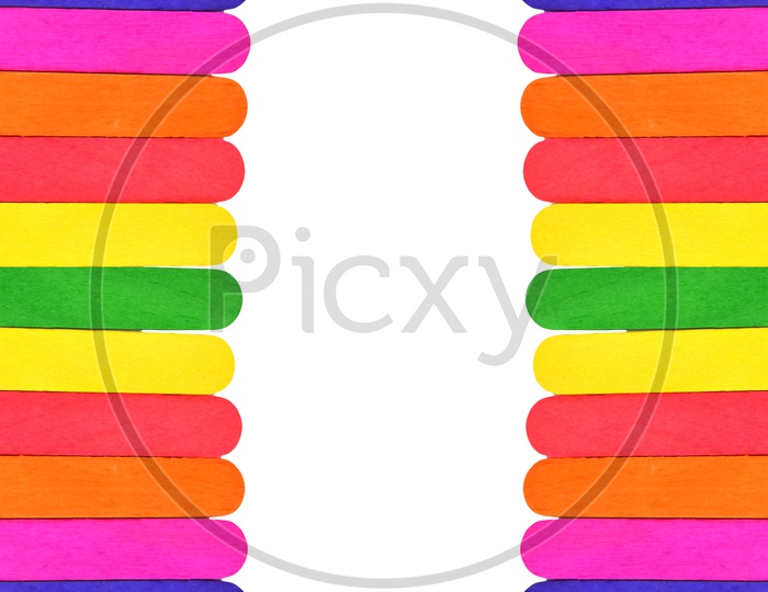 Colourful Ice Cream Sticks Patterns With Copy Space For text on Isolated White