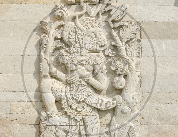 Stone carving of a Statue in a Balinese Temple