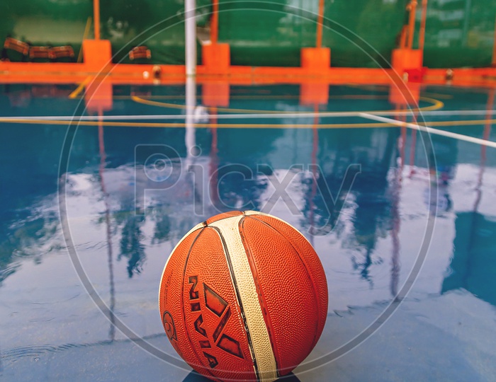 BasketBall on a wet court
