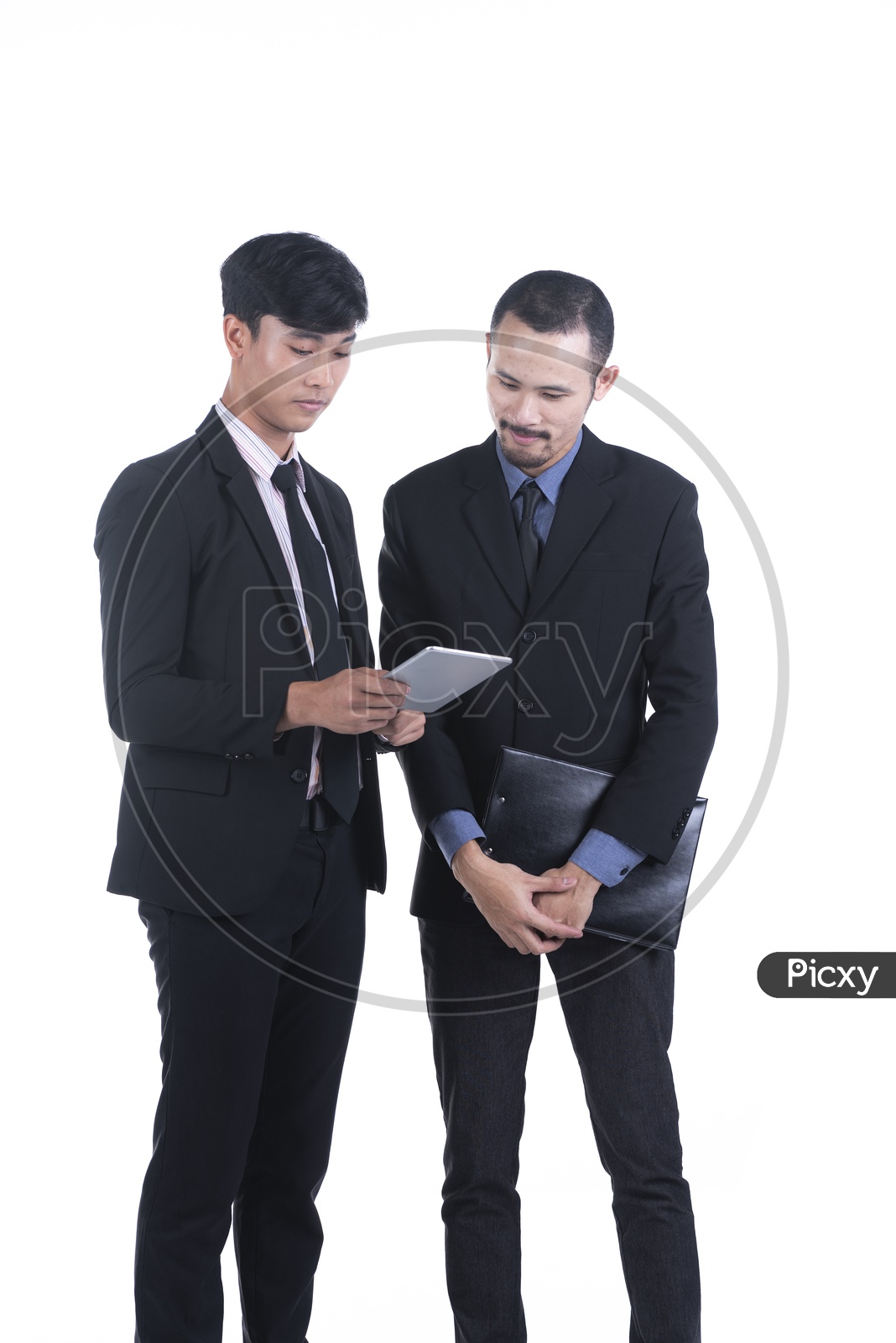 Couple Of Young Business Man Using Tablet  Gadget Over an Isolated White Background