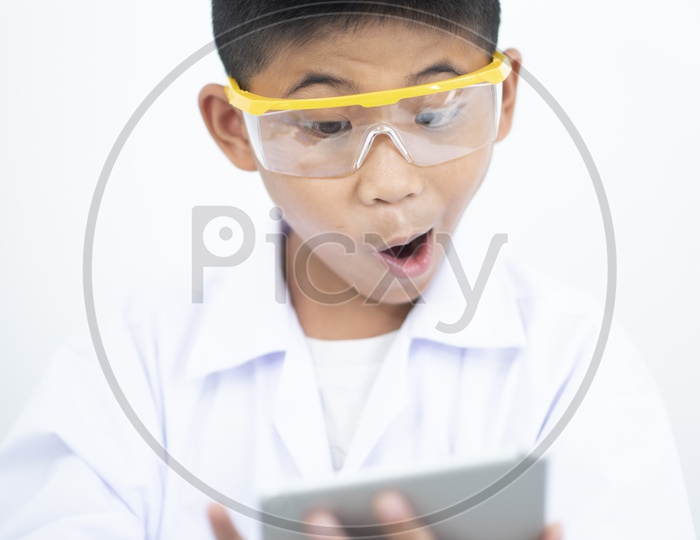 Children researcher Using Tablet Gadget With Excitement In a  Laboratory