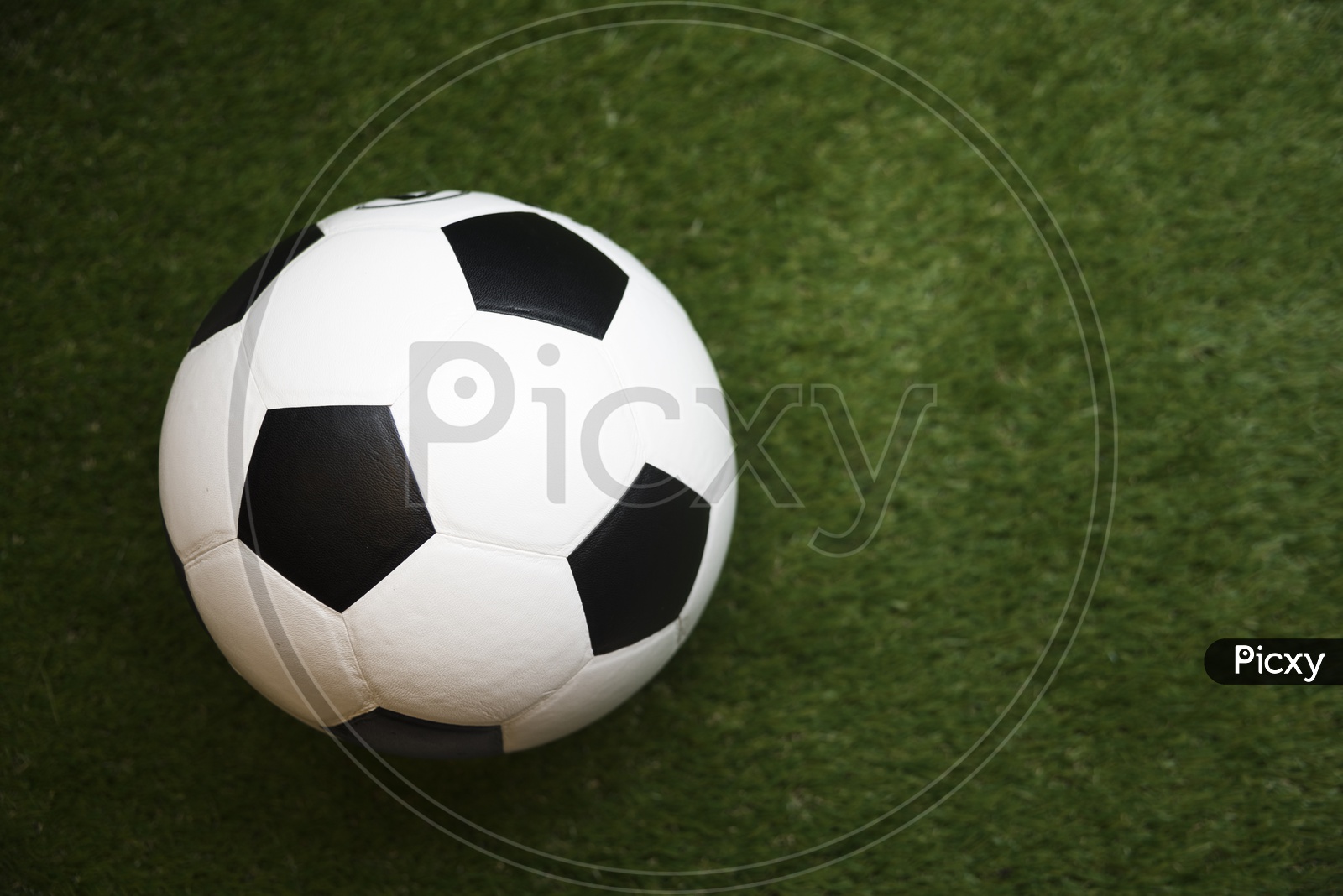 soccer ball with green background