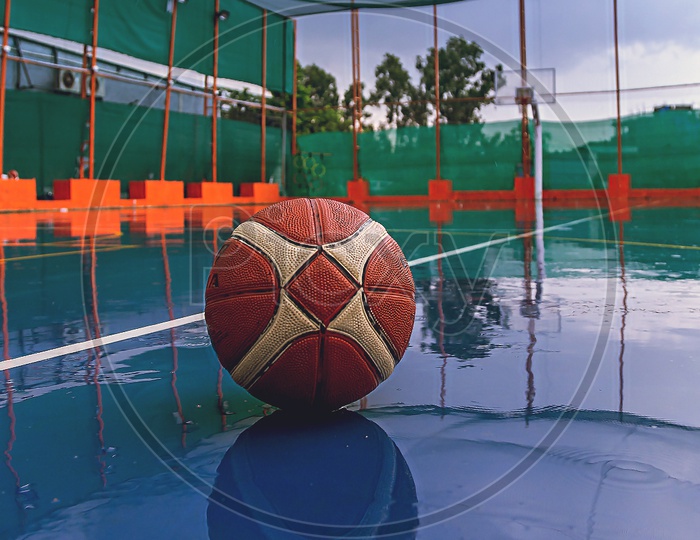 BasketBall on a wet court
