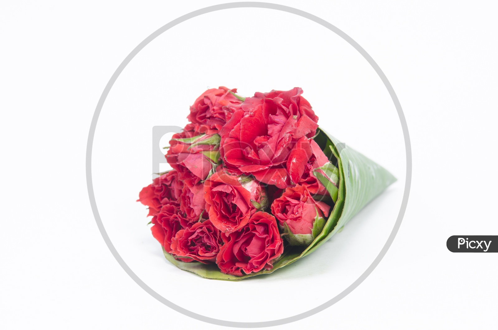 A Rose flower bouquet with Banana Leaf