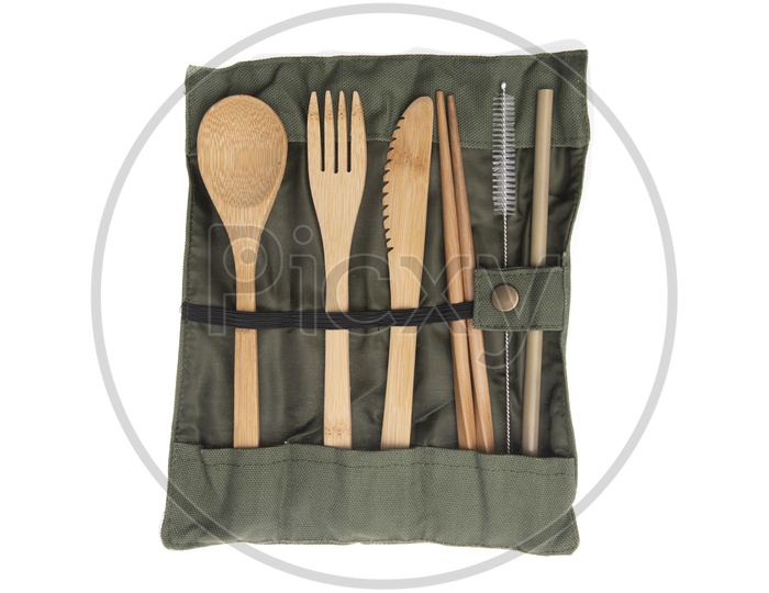 Eco friendly reusable recyclable personal care products, eco bag, steel straw, jar and wooden cutlery on wooden background. Concept zero waste