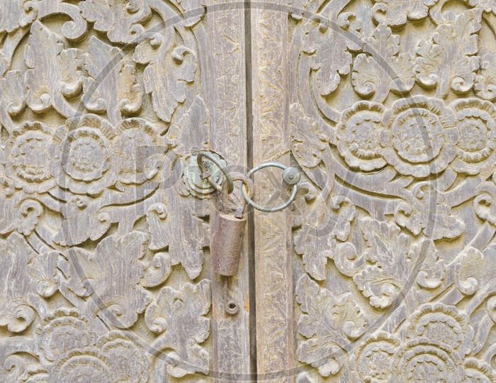 Ancient pad lock of a door in Bali