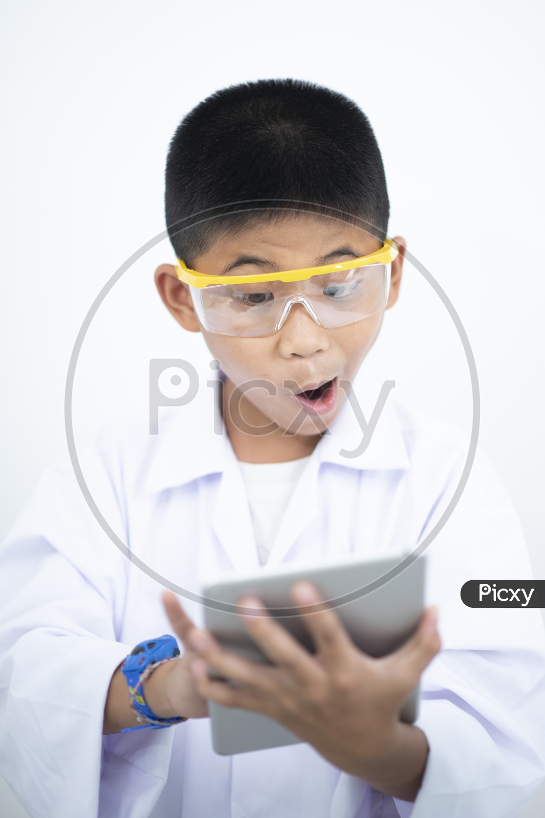 Children researcher Using Tablet Gadget With Excitement In a  Laboratory