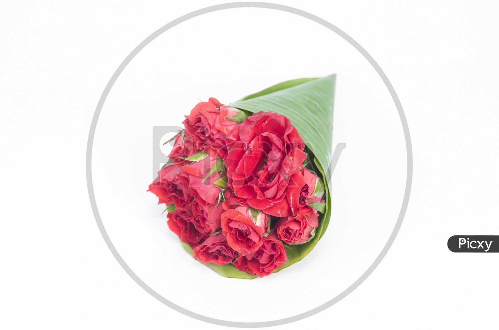 A flower bouquet with banana leaf