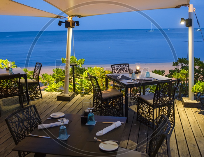 Table setting at beach restaurant in twilight time in Thailand
