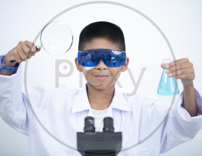 Child  Researcher  working in a chemical lab