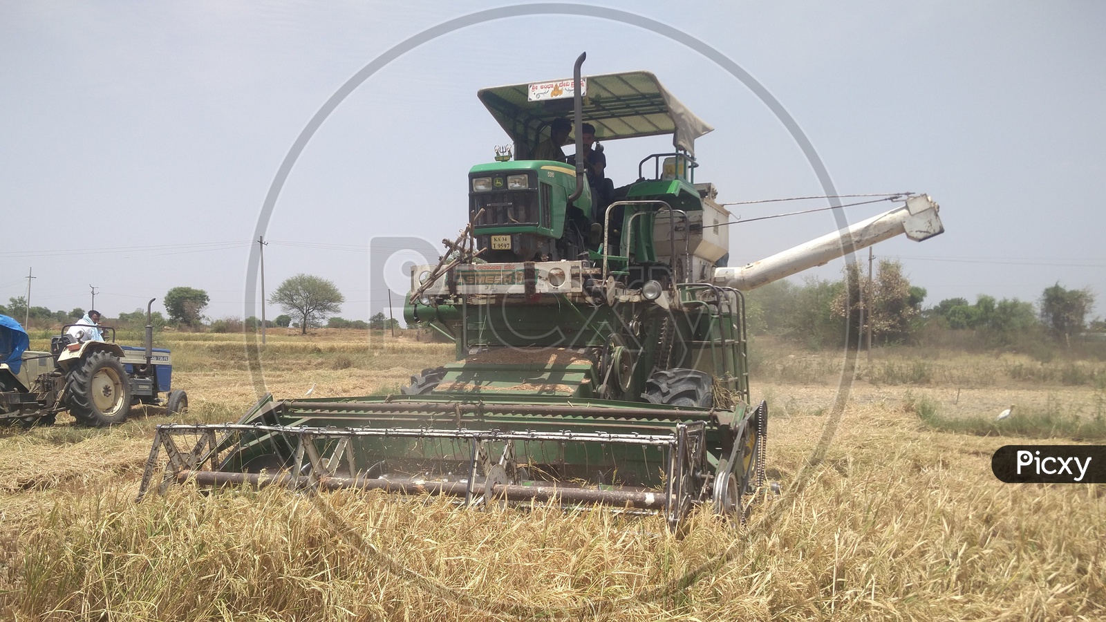 A Tractor or Harvester in Agriculture Field
