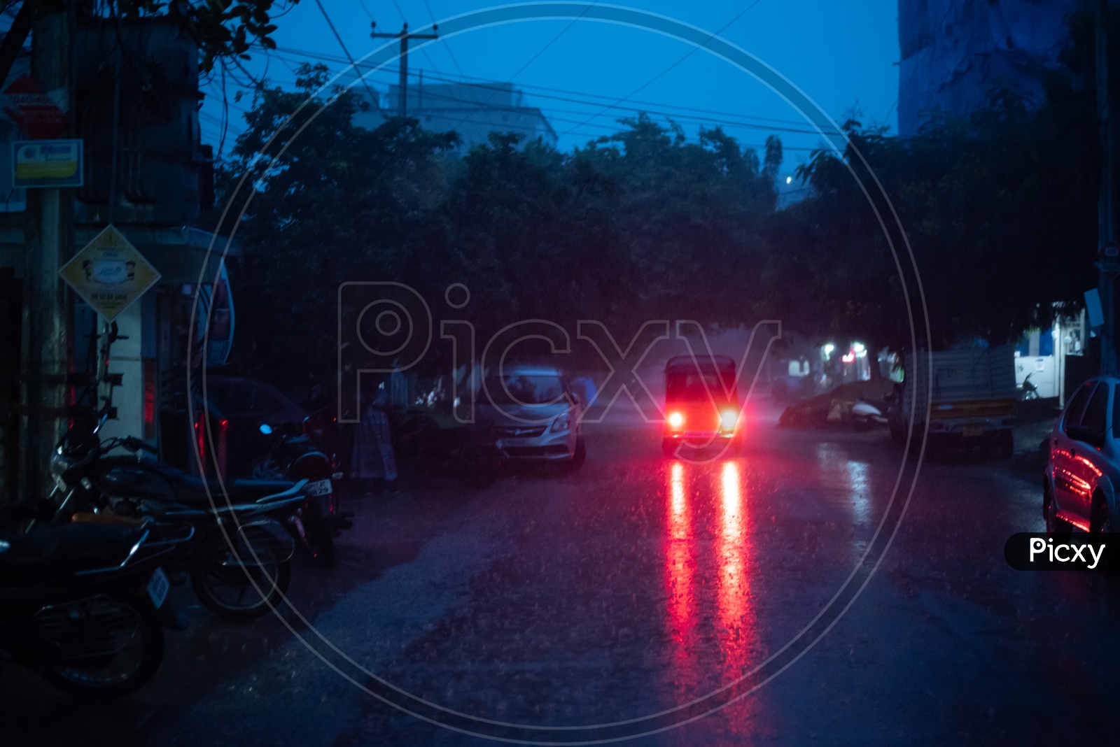 Commuting Vehicles Moving on  Hyderabad City In Heavy Rain