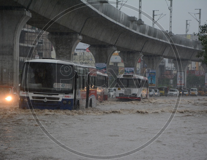 Commuting Vehicles On Heavy Flooded Roads of Hyderabad Due to Heavy Rainfall