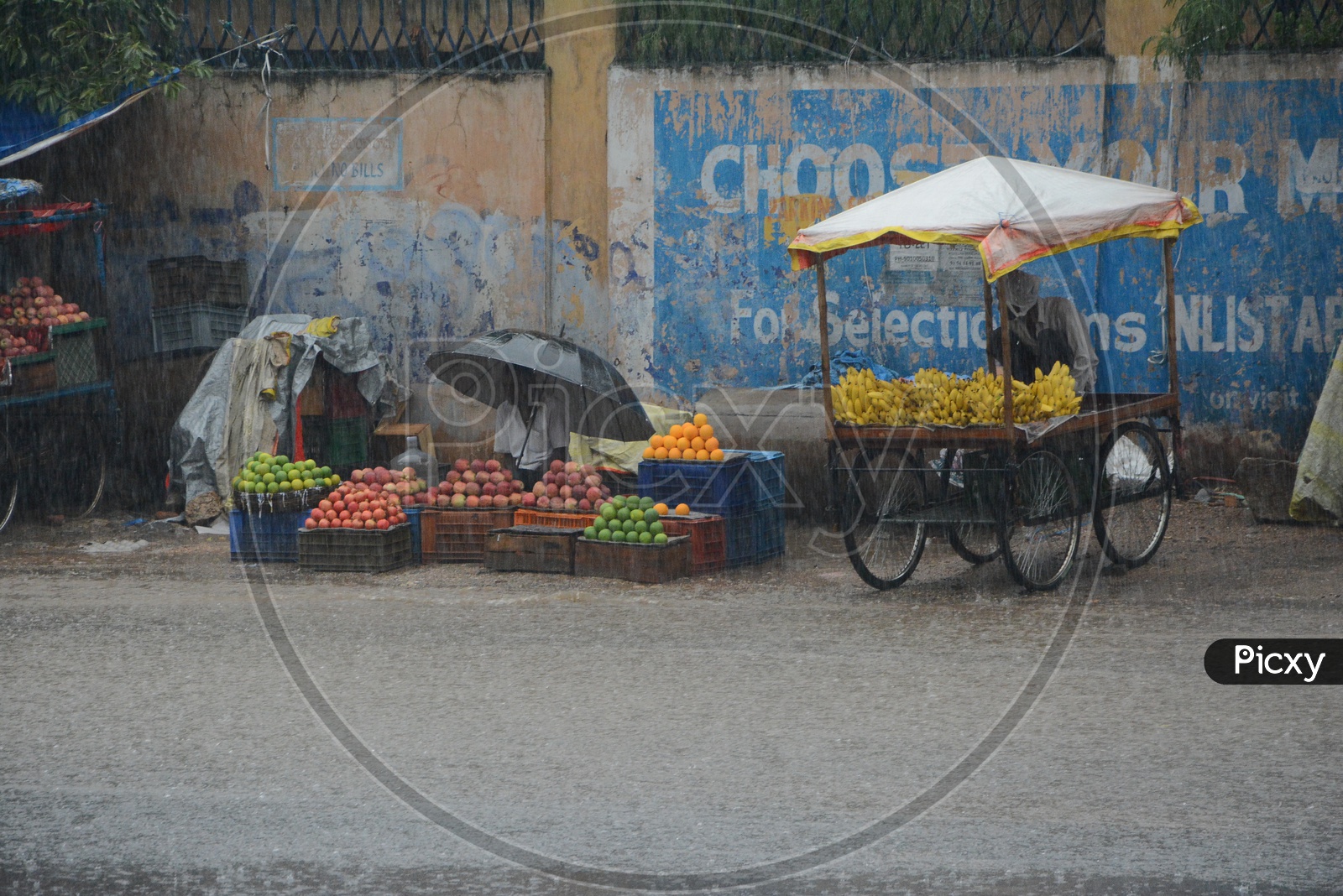 Fruits Vendors Drenching In Heavy rainfall