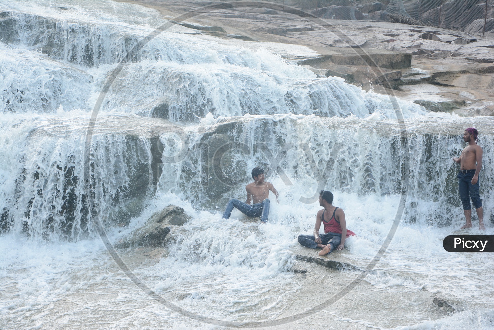 Image of Visitors Chilling at Kuntala Waterfalls-RW413211-Picxy