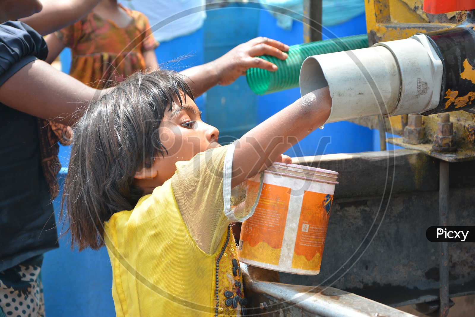 Water Problem or Drinking water Crisis  In Hyderabad With Young Children Taking Water  from Water Tank Leakage  For drinking