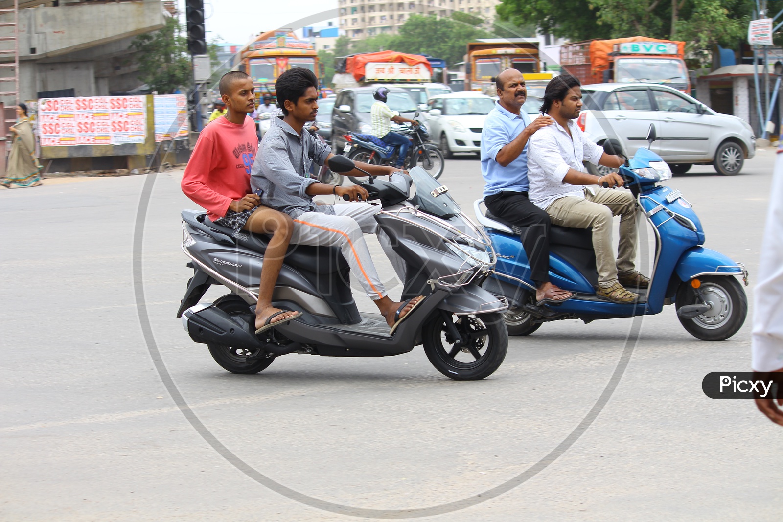City Commuters Traffic Rules Violation With Out Wearing Helmet