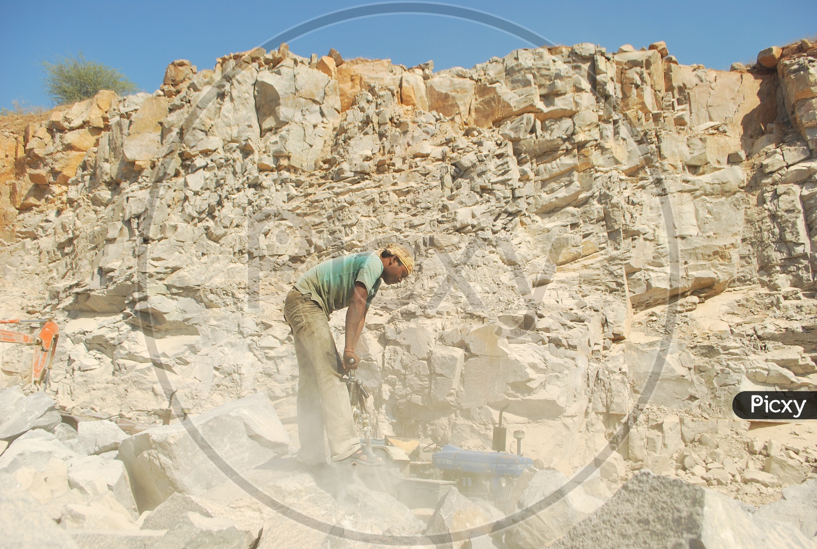 Drilling Worker Working at Rock or Stone Quarry
