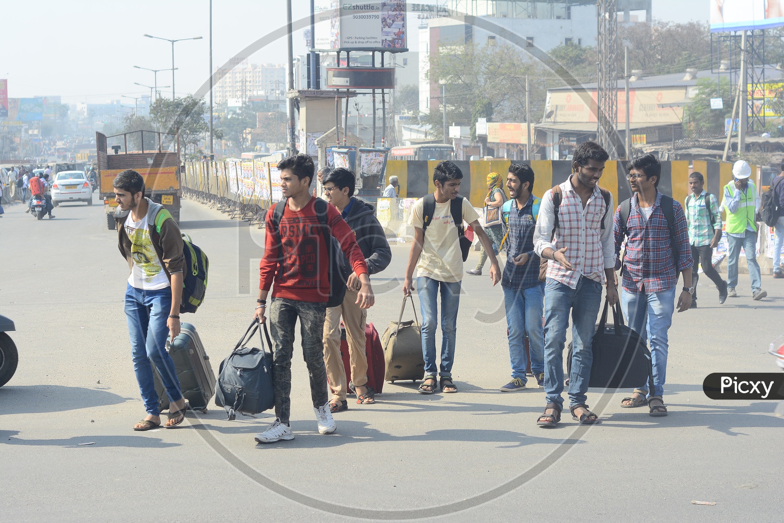 Image of College Students Leaving to Homes With Luggage Bags For ...