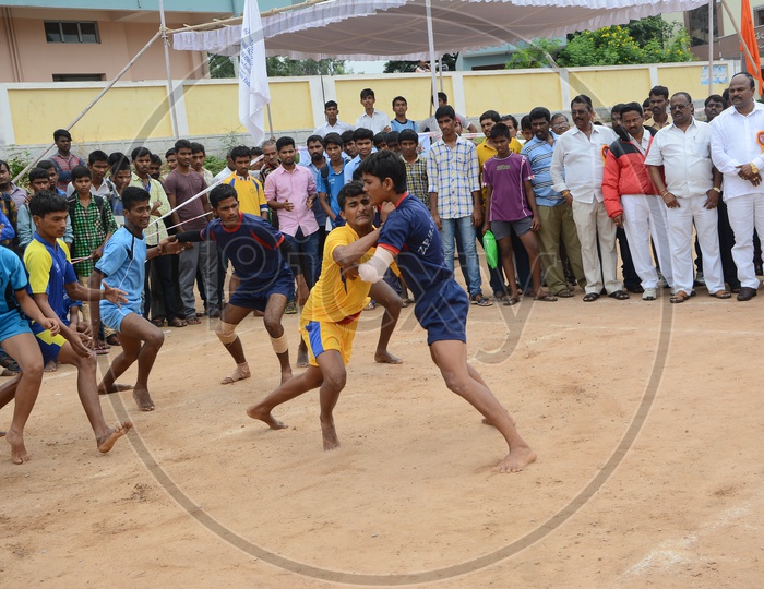 Young   Athletes Playing  Kabbadi  In a School Sports Event