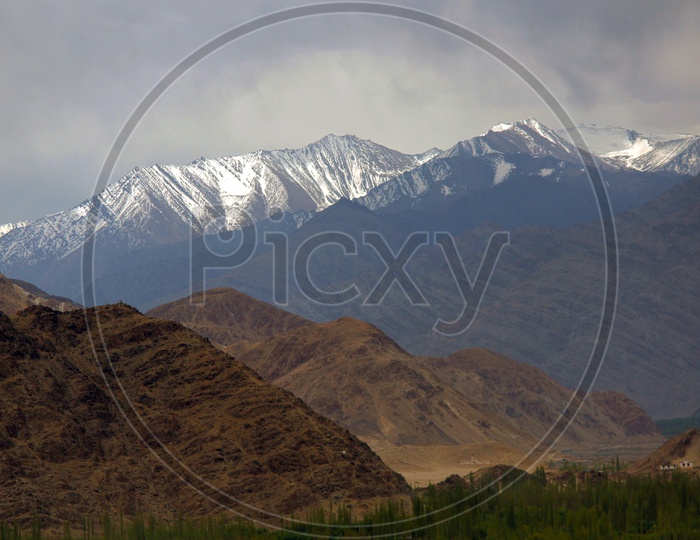 Snow Capped and Silver covered Mountains