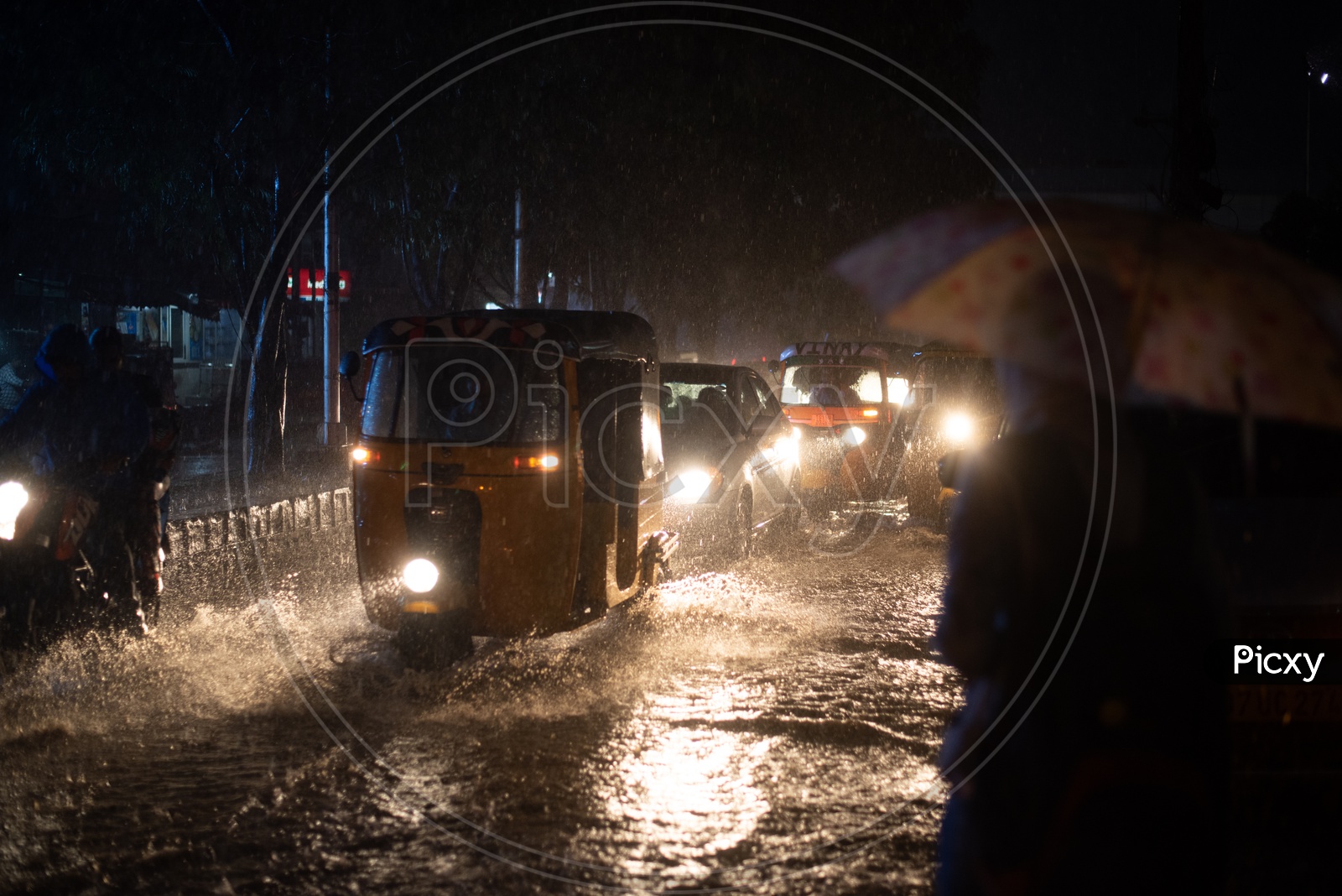 Commuting Vehicles Moving On Flooded Roads With Water Splash Due to Heavy Rain in Hyderabad