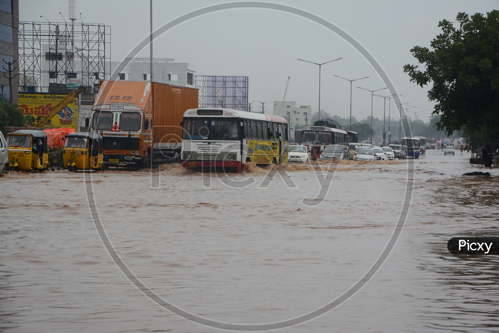 Flooded Roads Of Hyderabad With Drowned Commuting Vehicles  Due to Heavy Rains