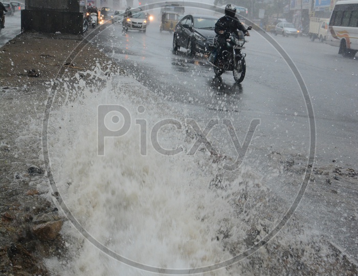 Rain water Overflow From a Manhole On Roads Due to Heavy Rainfall