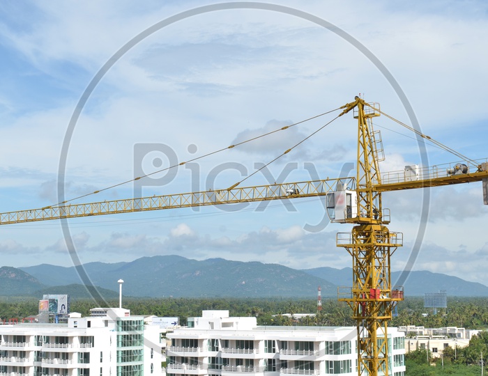 Crane and building working progress At High Rise Construction  Buildings