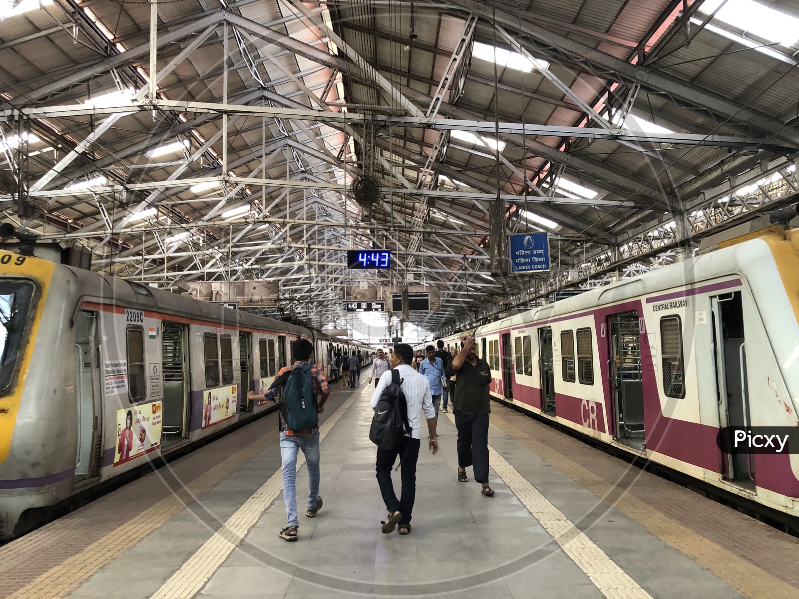 Commuters on Platforms Of  Mumbai Suburban Train Station