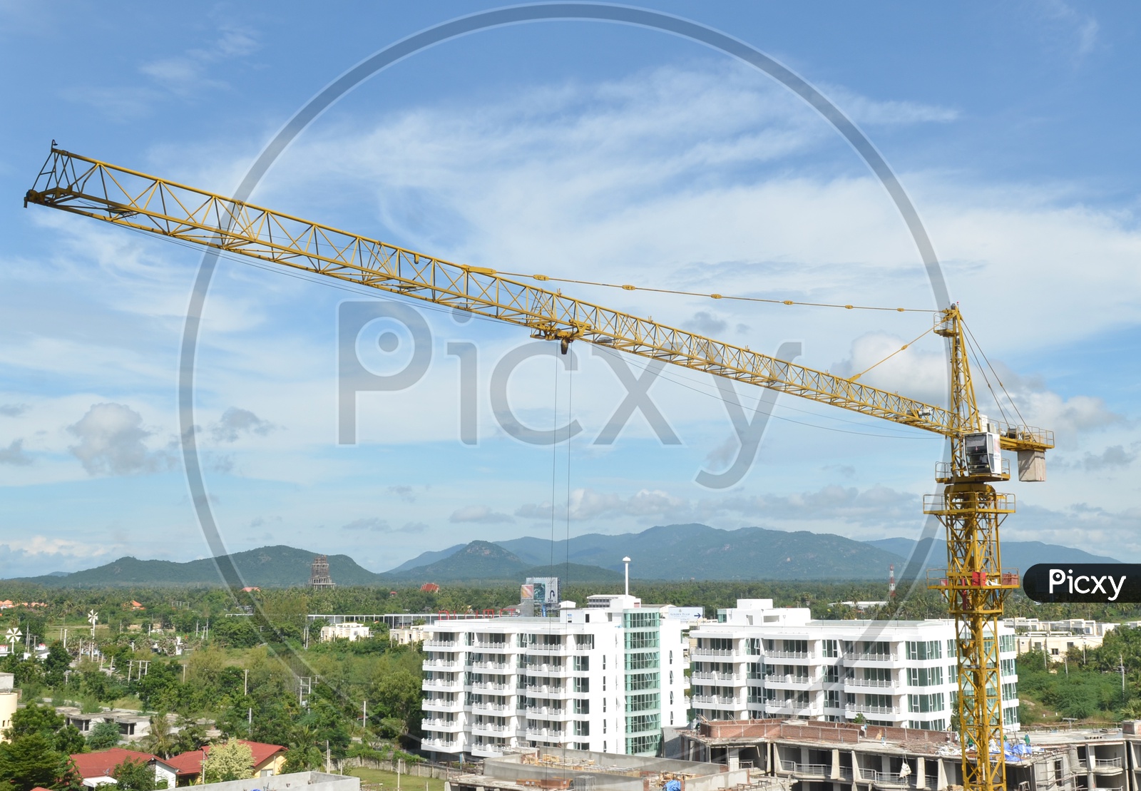 Crane and building working progress At High Rise Construction  Buildings
