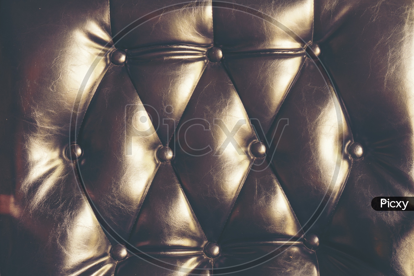 dark leather texture background with buttoned pattern
