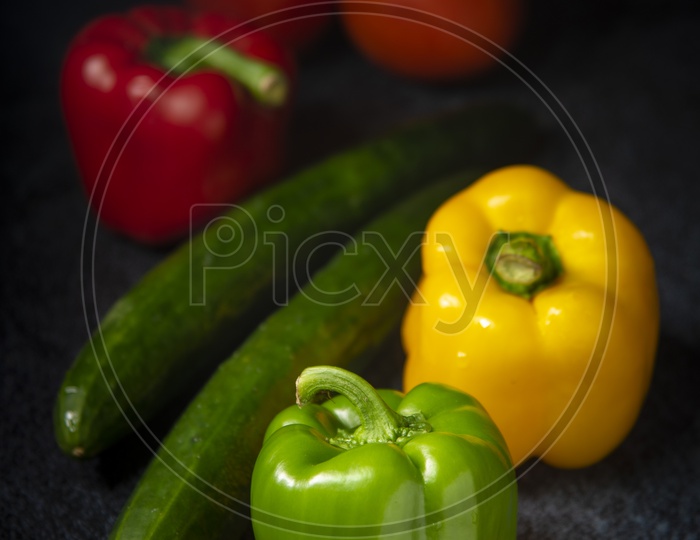 Bell Pepper or Capsicum on wooden background