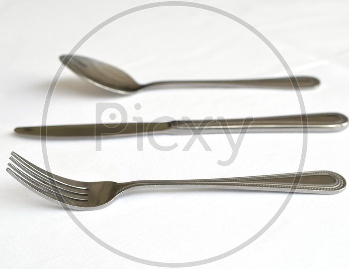 Fork spoon and knife on the table